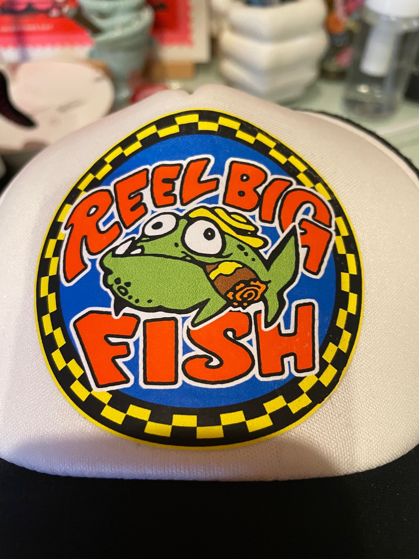 Silly Fish round logo trucker hat