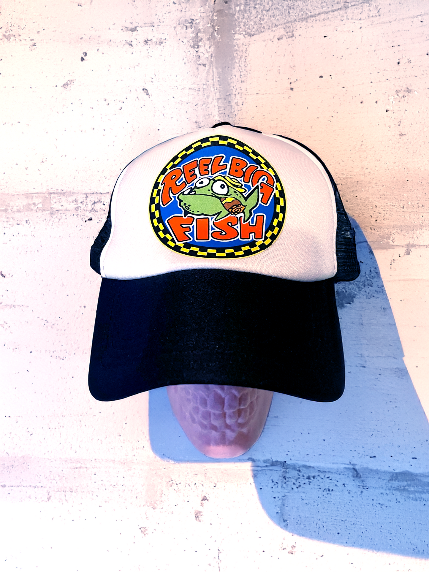 Silly Fish round logo trucker hat