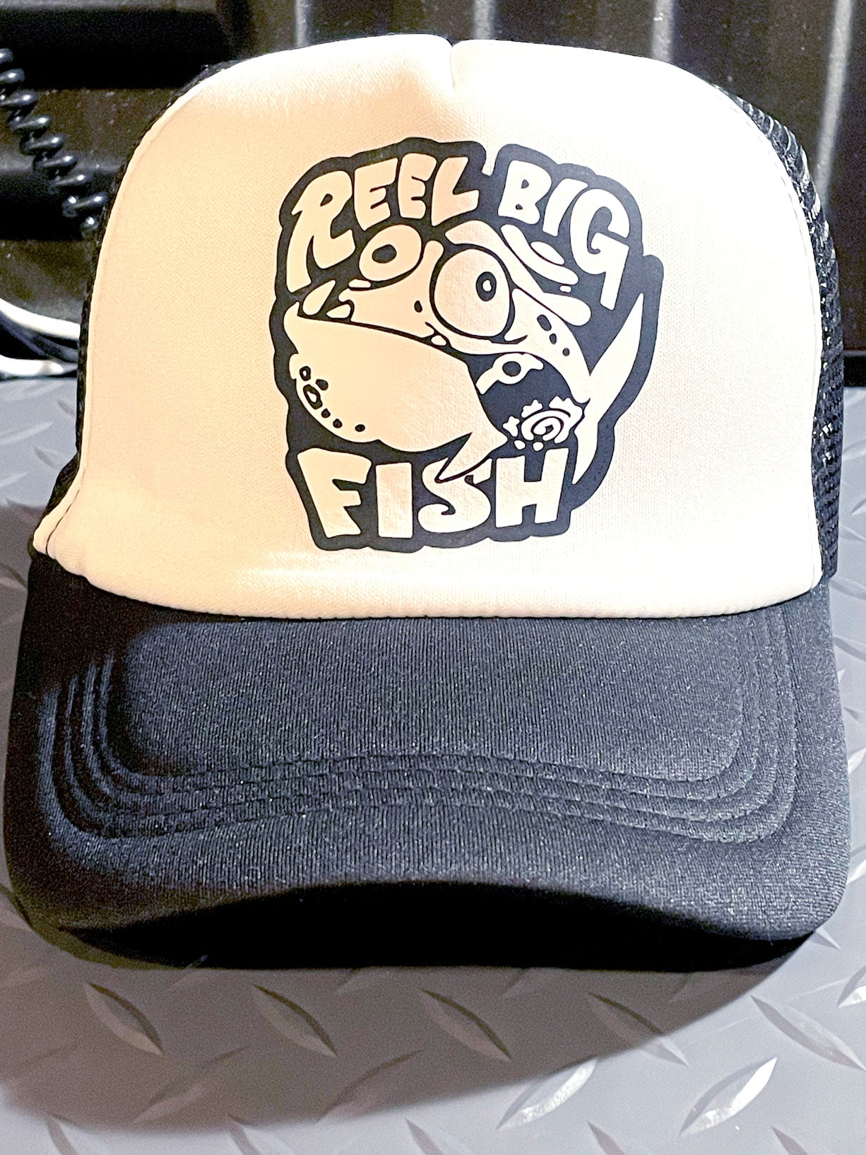 Silly fish logo trucker hat