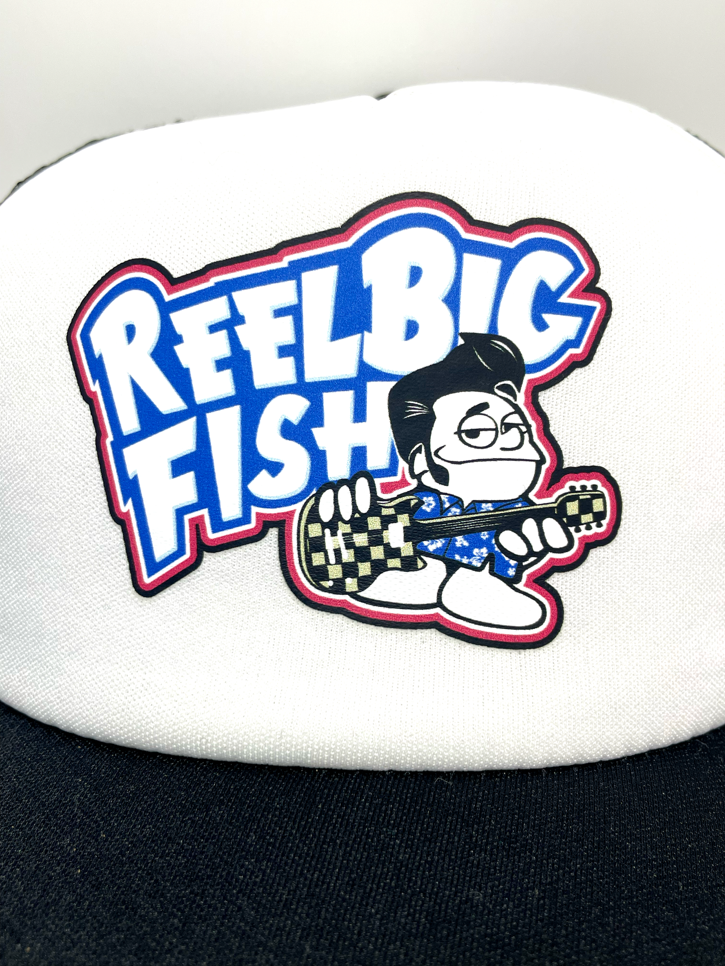 Punchy logo trucker hat